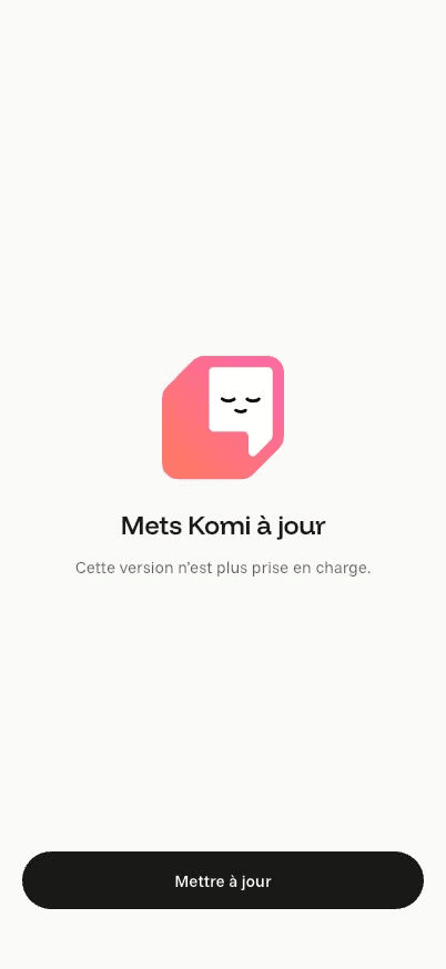 Écran « Mise à jour requise » de l’application Komi sur iPhone